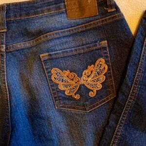 WALK - Blue low-rise bootcut jeans with embroidered butterfly pockets